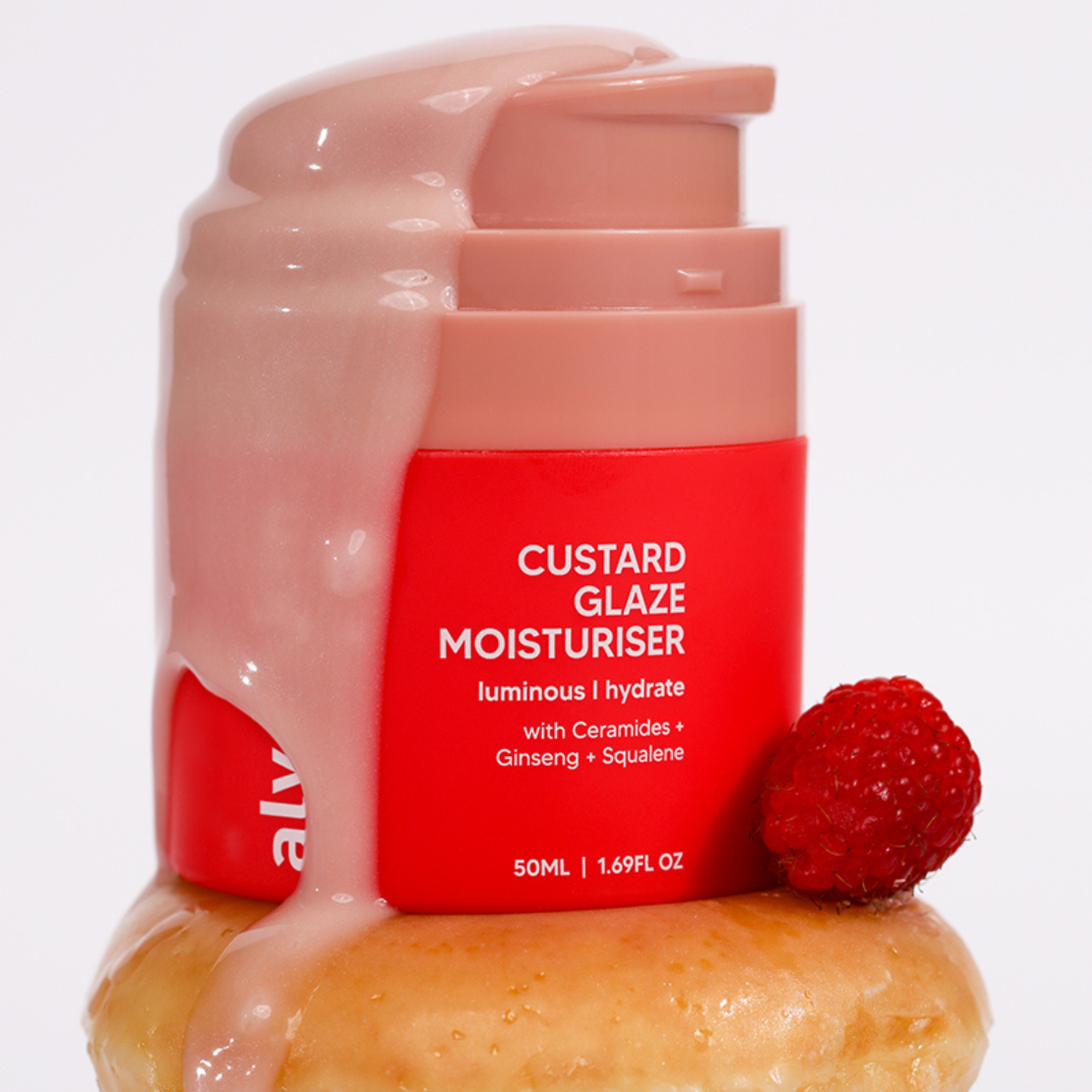 Alya Skin Custard glaze moisturizer with a raspberry and doughnut on a white background