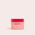 A jar of Alya Skin Pink Marine Collagen Sleep Mask on a beige background.
